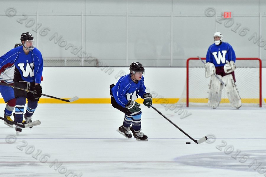 Wheaton College Men\'s Ice Hockey vs Middlesex Community College. - Photo By: KEITH NORDSTROM